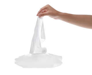 Woman taking wet wipe from pack on white background, closeup