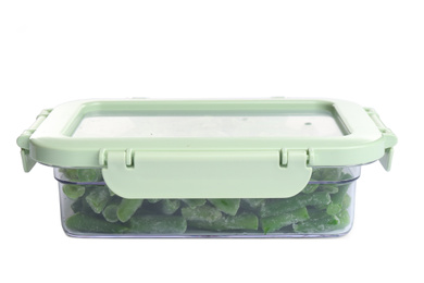 Frozen green beans in plastic container isolated on white. Vegetable preservation