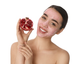 Photo of Woman with pomegranate face mask and fresh fruit on white background