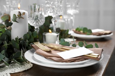 Photo of Luxury table setting with beautiful decor and blank card. Festive dinner