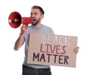 Emotional man shouting into megaphone while holding sign with phrase Black Lives Matter on white background. End Racism