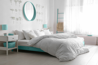 Stylish bedroom interior design inspired by color of the year 2020 (bleached coral)