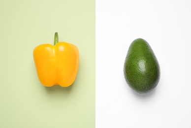 Bell pepper and avocado on color background, flat lay. Fresh vegetables