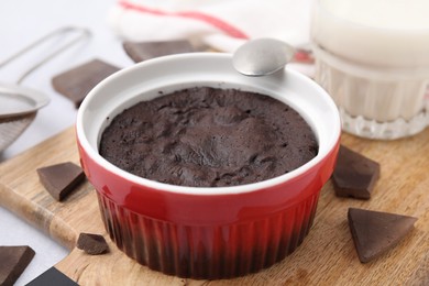 Photo of Tasty chocolate pie on table, closeup. Microwave cake recipe