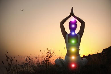 Woman meditating outdoors at sunset, back view. Scheme of seven chakras, illustration