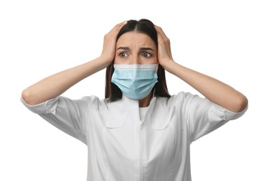 Doctor with protective mask feeling fear on white background