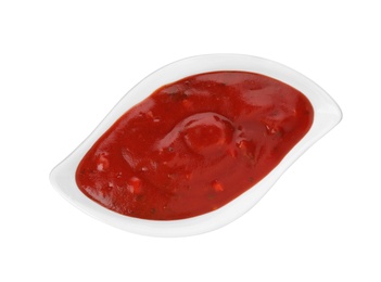 Gravy boat with spicy chili sauce on white background, top view