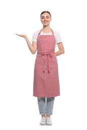 Beautiful young woman in clean striped apron on white background
