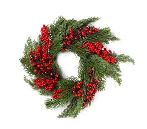 Beautiful Christmas wreath with red berries and fir tree twigs isolated on white