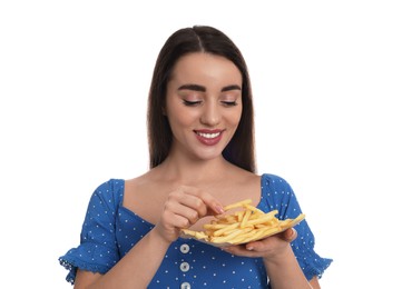 Beautiful young woman with French fries on white background
