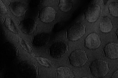 Textured black fabric as background, closeup view