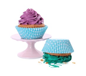 Smashed and good cupcakes on white background. Troubles happen