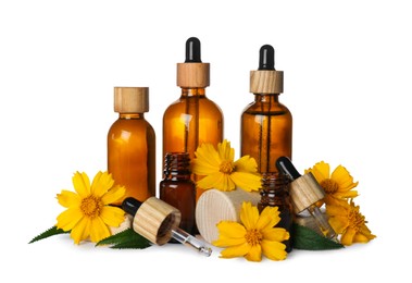Bottles of buttercup essential oil and flowers on white background