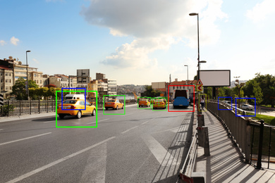 City road with scanner frames on cars outdoors. Machine learning