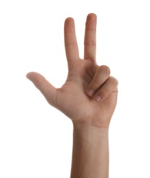 Teenage boy showing three fingers white background, closeup
