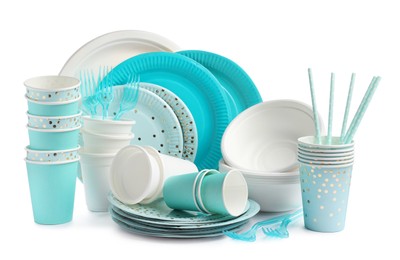 Set of different disposable tableware on white background