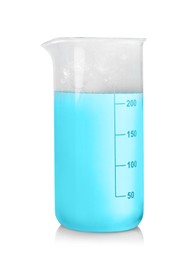 Photo of Laboratory beaker with colorful liquid isolated on white. Chemical reaction