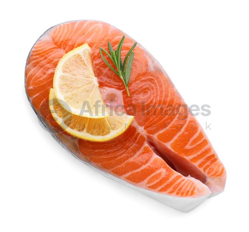 Fresh raw salmon steak with rosemary and lemon on white background, top view