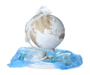 Photo of Globe and plastic garbage isolated on white. Environmental protection concept