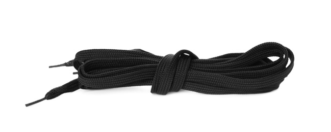 Black shoe laces tied in knot isolated on white