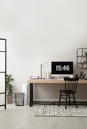 Modern workplace with computer in room. Interior design