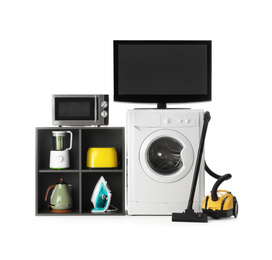 Photo of Set of different home appliances with vacuum cleaner on white background