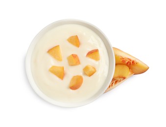 Delicious yogurt with fresh peach on white background, top view