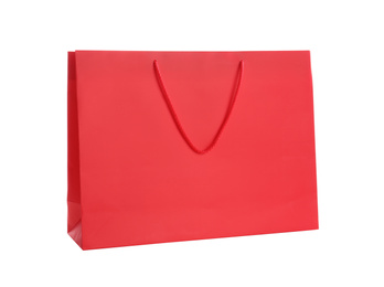 Red paper shopping bag isolated on white