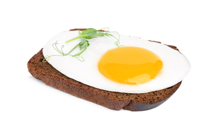 Tasty fried egg with sprouts and rye bread isolated on white