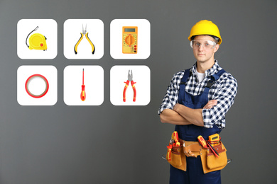 Young electrician and tools and grey background