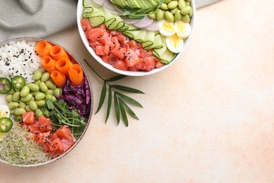 Photo of Delicious poke bowls with vegetables, fish and edamame beans on light table, flat lay. Space for text