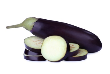 Cut and whole fresh ripe eggplants on white background