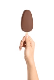 Photo of Woman holding ice cream glazed in chocolate on white background, closeup