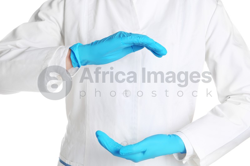 Doctor in medical gloves showing gesture on white background