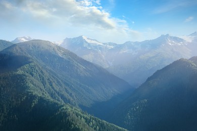 Aerial view of beautiful landscape with mountain forest on sunny day