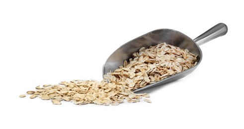 Oatmeal and metal scoop on white background