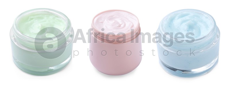 Set with jars of body cream on white background. Banner design