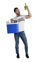 Happy man with cool box and bottles of beer on white background