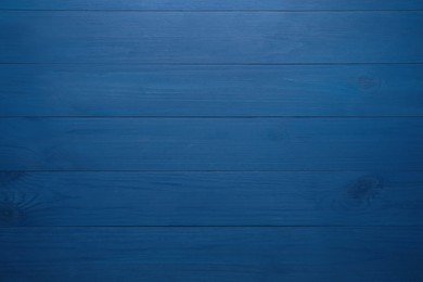 Texture of blue wooden surface as background, top view