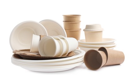 Set of disposable tableware on white background