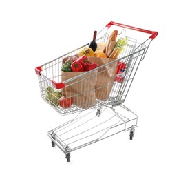 Shopping cart full of groceries on white background
