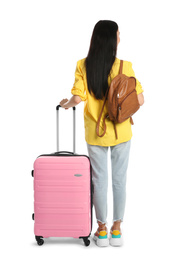 Beautiful woman with suitcase and backpack for summer trip on white background, back view. Vacation travel
