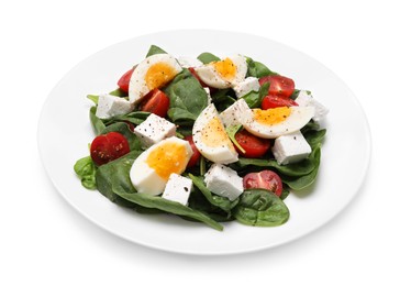 Photo of Delicious salad with boiled eggs, feta cheese and tomatoes isolated on white