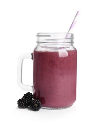 Mason jar of tasty blackberry smoothie and fresh fruits on white background
