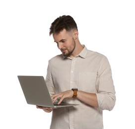 Handsome man working with laptop on white background