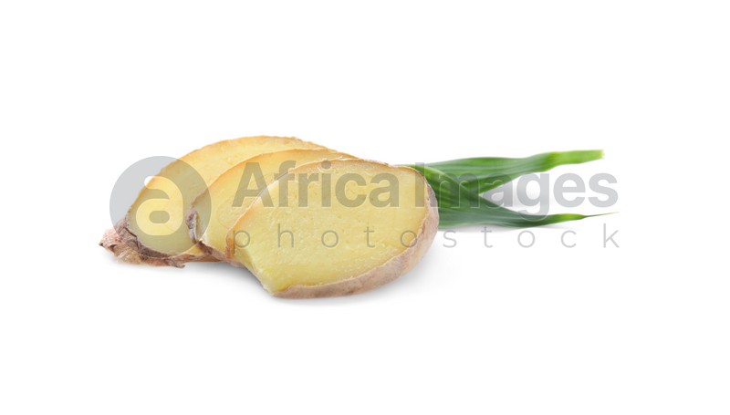 Photo of Slices of fresh ginger and leaves isolated on white