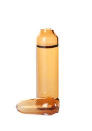 Open glass ampoule with pharmaceutical product on white background