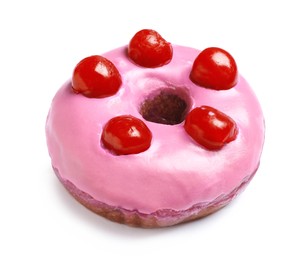 Sweet delicious glazed donut decorated with berries on white background