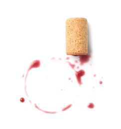 Bottle cork with wine stains isolated on white, top view