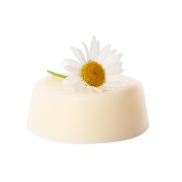Solid shampoo bar and chamomile isolated on white. Hair care